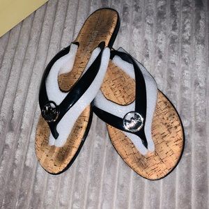MK Thong flip flops
